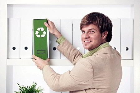 Businessman with green recycle folder