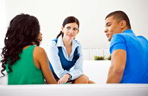 Couple with counselor (iStockphoto)