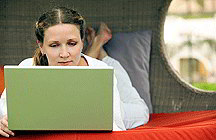 Female student on computer (iStockphoto)