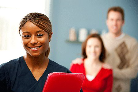 Nurse with patients (iStockphoto)
