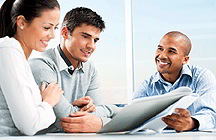 Financial advisor and clients (iStockphoto)