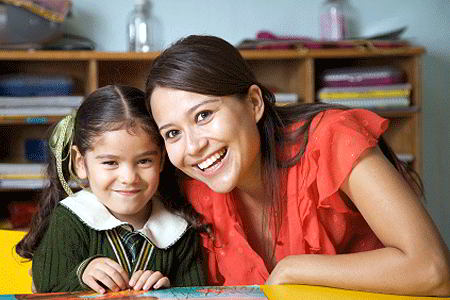 Teacher and young student (iStockphoto)
